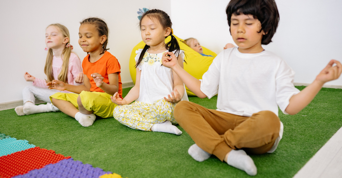 Children doing mindful breathing together 